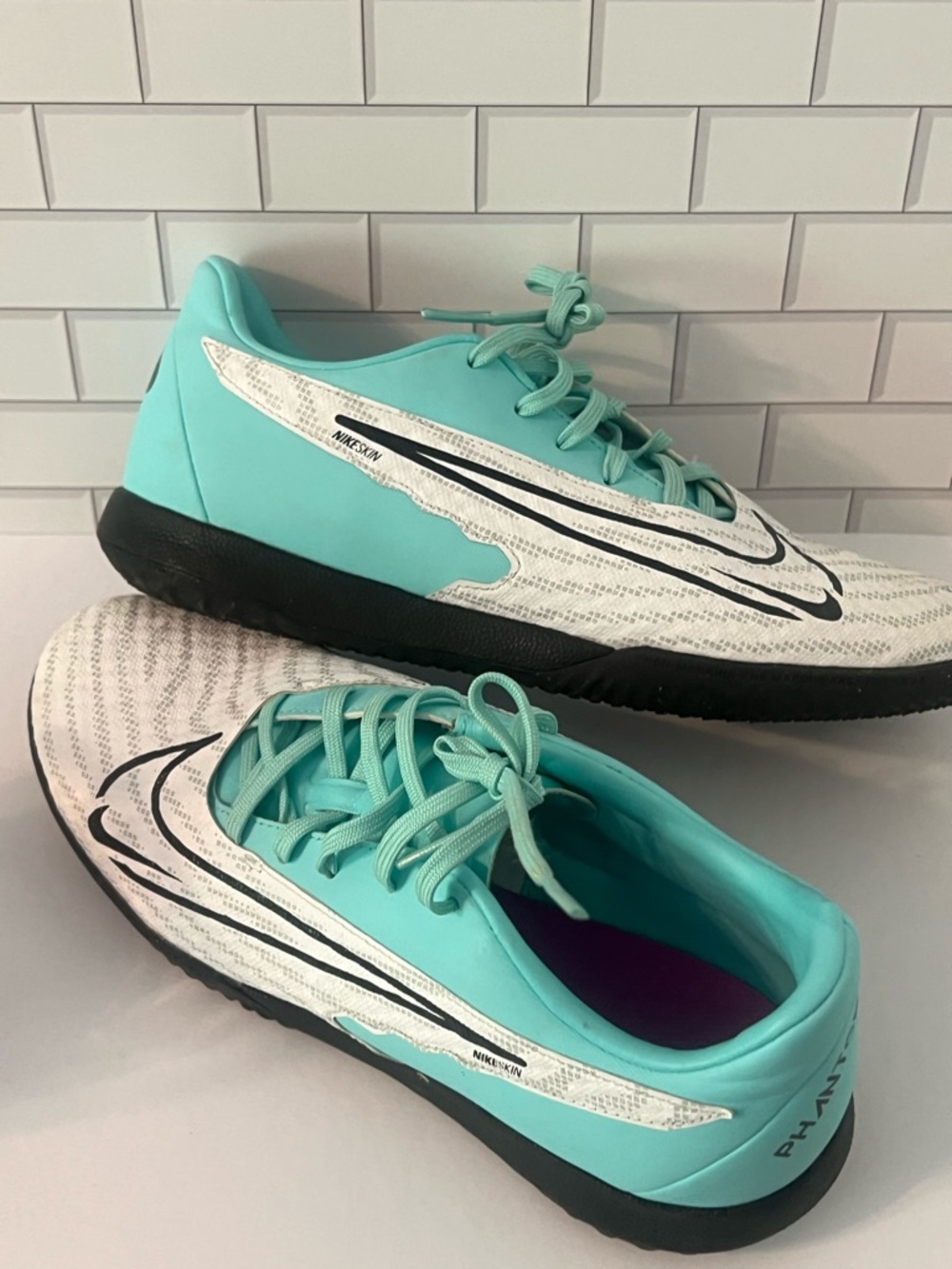 Nike Label Tag with Black Swoosh on White indoor soccer